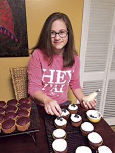 Katelyn Lowe, 13, of Columbus is selling homemade baked goods this summer. She plans to donate part of the proceeds to charity. Katelyn Lowe, 13, of Columbus is selling homemade baked goods this summer. She plans to donate part of the proceeds to charity. Photo by: Courtesy photo