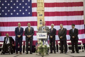Stark Aerospace CEO Tom Ronaldi, flanked by Mississippi and Israeli officials, thanks guests for attending a commemoration event for the delivery of a missile defense canister to Israel - Alex Holloway, Dispatch Staff